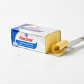 Anchor salted butter with a knife taking a slice on a white background